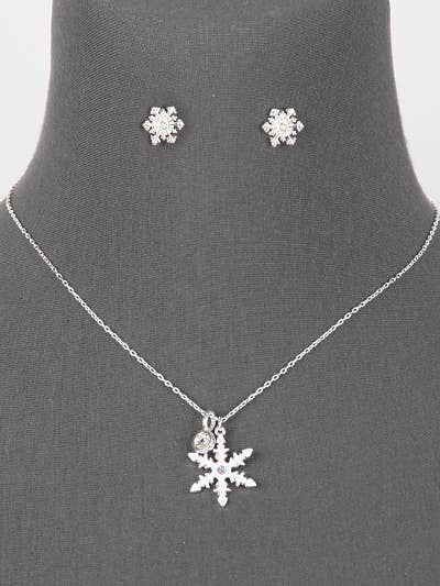 Snowflake necklace on a gray neck form, full view