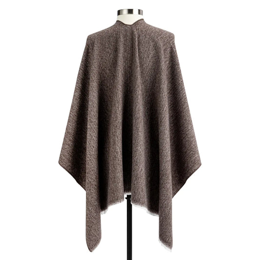 Back of the heathered taupe keyhole wrap on a dress form, showing the cream trim running along the edge