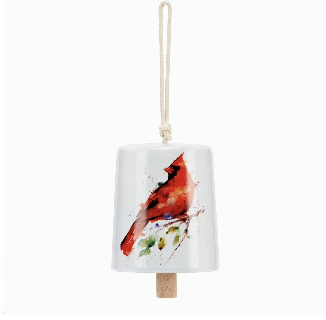 White ceramic Mini Inspired Bell with a red cardinal on a branch hanging from a cord