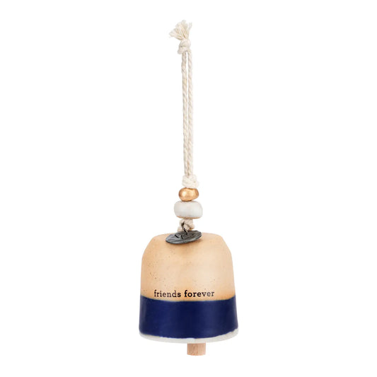 Cream Mini Inspired Bell with a navy band hanging from a cord with wooden beads