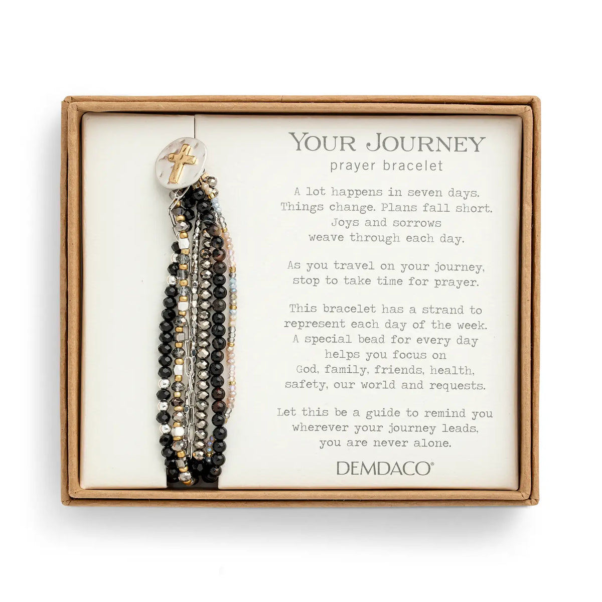 The black prayer bracelet mounted on its printed Demdaco Your Journey gift card