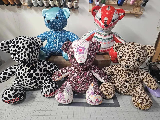 An assorted group of memory bears with different patterns made by Kim at Krafty Bandit