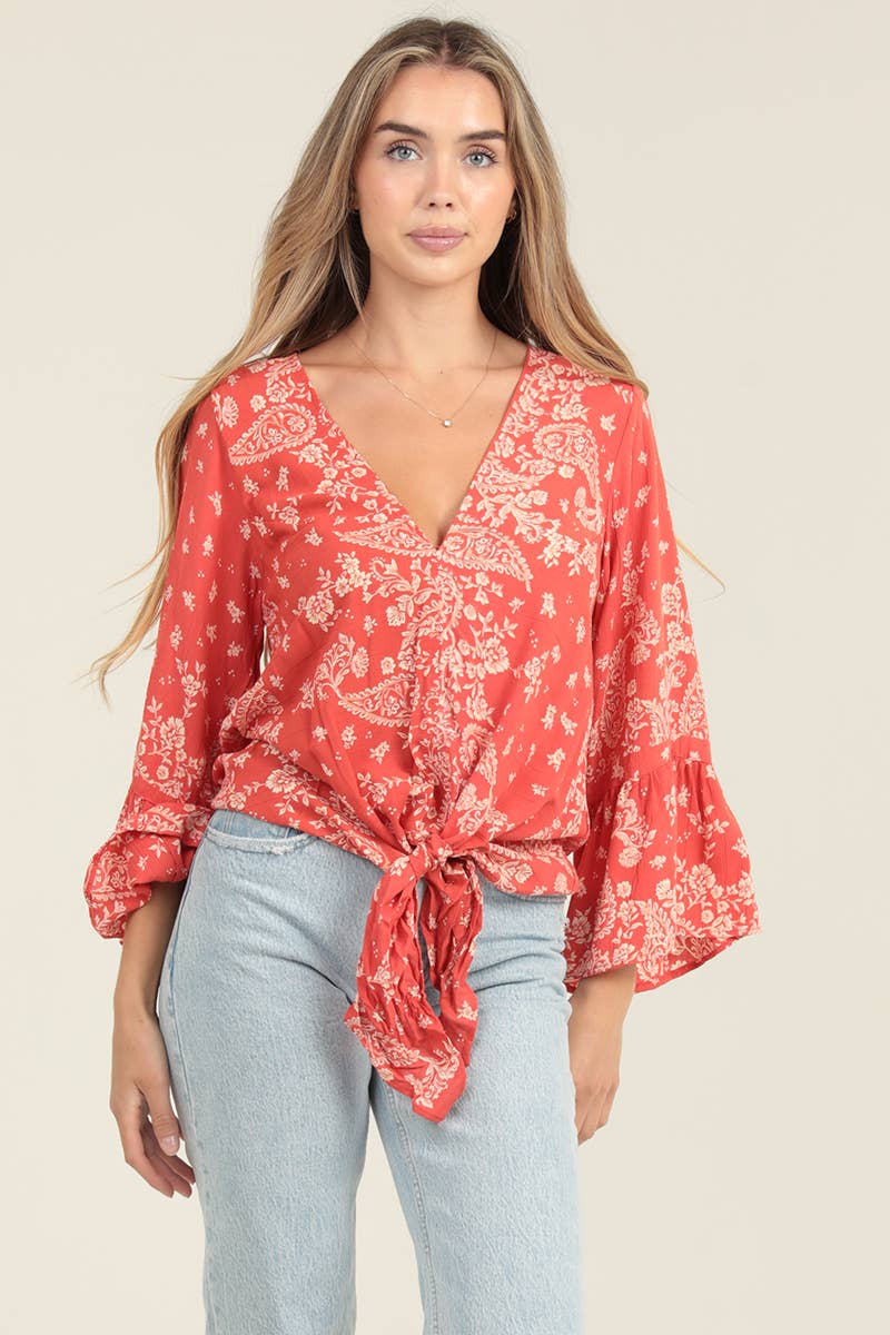 V NECK LONG SLEEVE TOP WITH A TIE AT THE WAIST