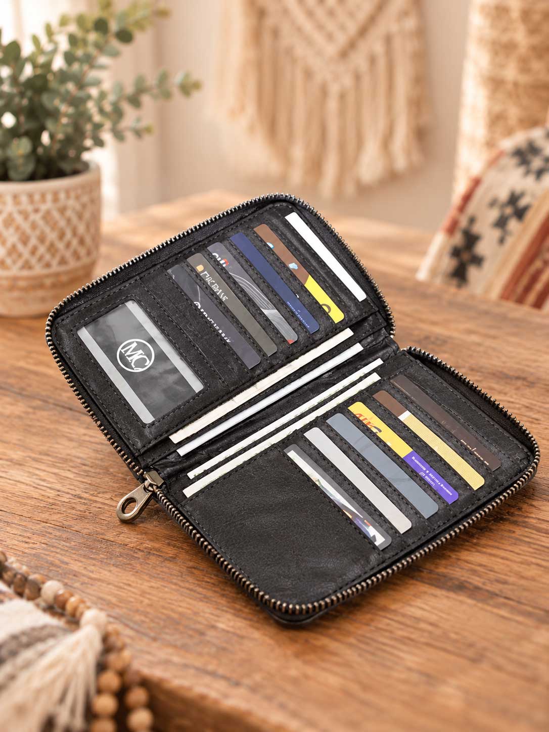 Open phone wallet interior with card slots, shown in black