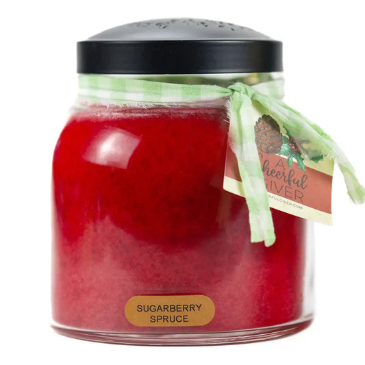 Sugarberry Spruce 34 oz red jar candle with a black lid and green gingham ribbon