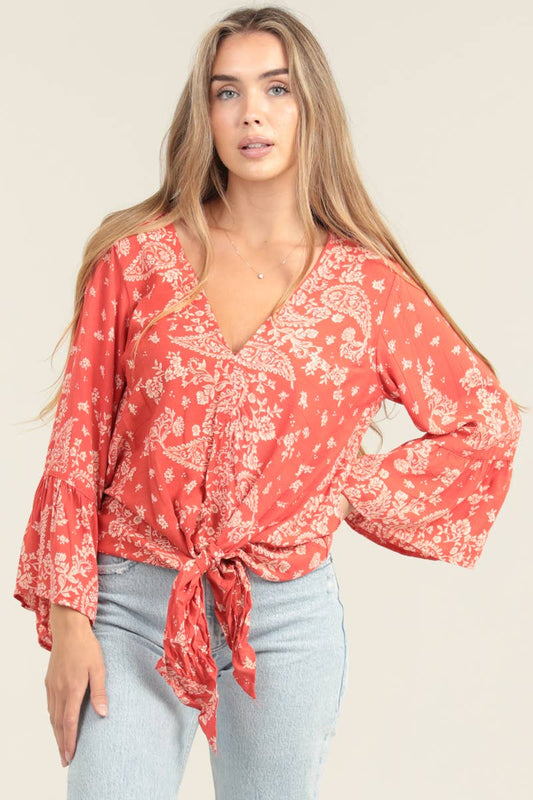 V NECK LONG SLEEVE TOP WITH A TIE AT THE WAIST