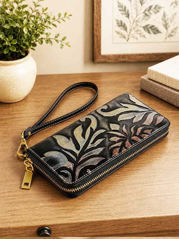 Black multi Odessa tooled embossed leather wristlet wallet with a floral scroll design