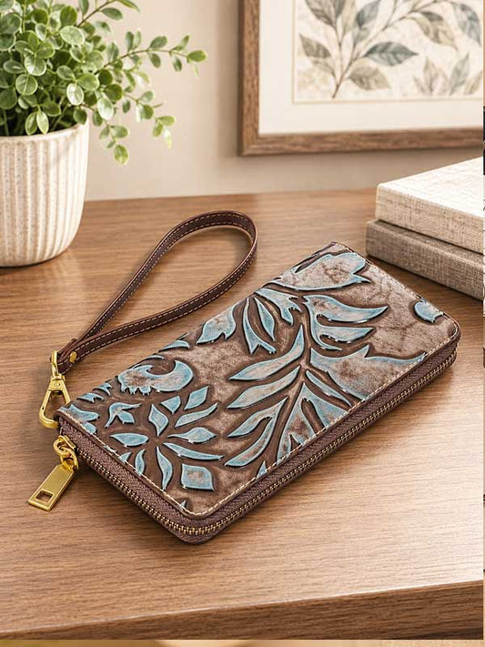 Turquoise Odessa tooled embossed leather wristlet wallet with a floral scroll design