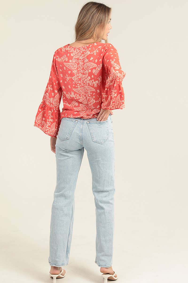 V NECK LONG SLEEVE TOP WITH A TIE AT THE WAIST