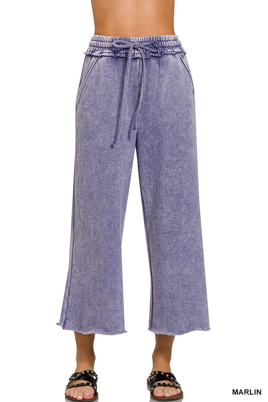 Marlin blue acid-wash fleece palazzo sweatpants with a wide leg, drawstring waist, and pockets.