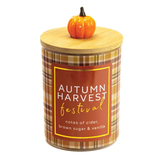 Autumn Harvest Festival scented 10 oz soy jar candle in a clear glass jar.