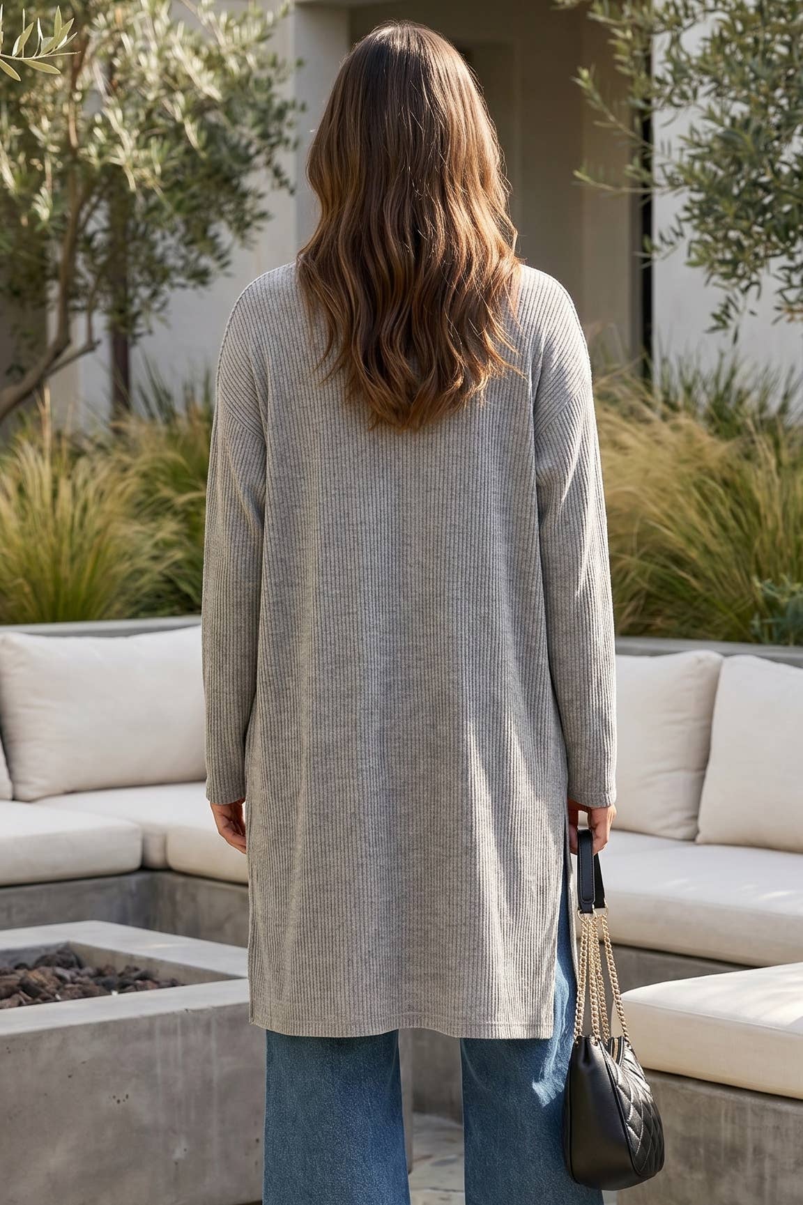 Olive green two-piece set with long sleeve sweater top and midi cardigan