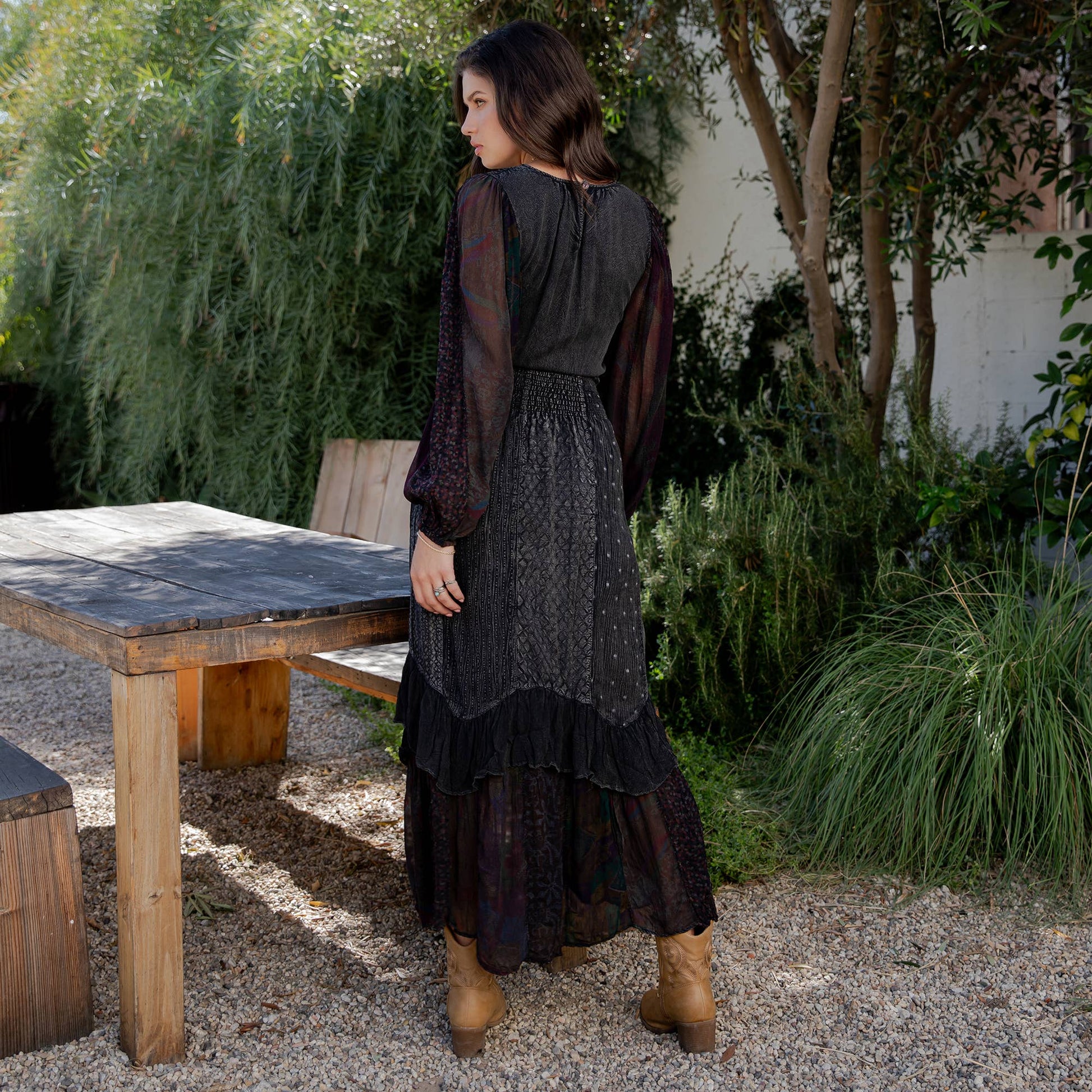 Back view of the charcoal maxi dress with sheer gathered sleeves