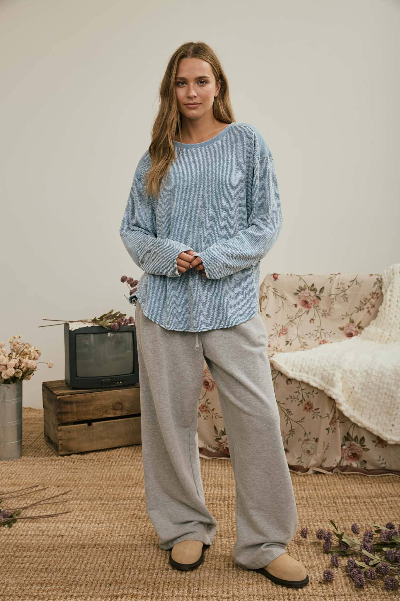Full-length look: light denim top with grey sweatpants