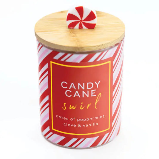 Candy Cane Swirl scented 10 oz soy jar candle in a clear glass jar.