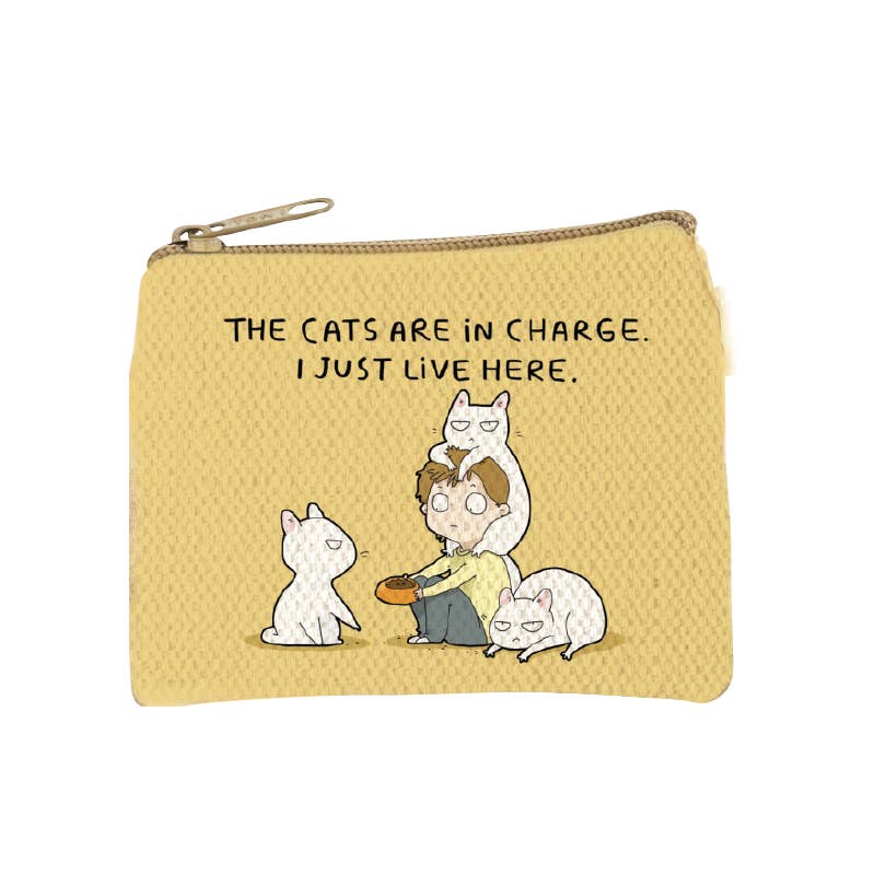 Golden yellow zip coin purse printed with a row of cats and the words the cats are in charge, I just live here