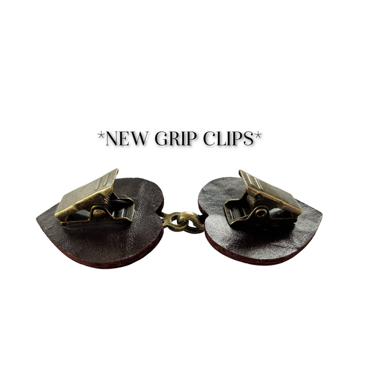 Grip-clip backing graphic: two alligator clips on dark brown leather tabs