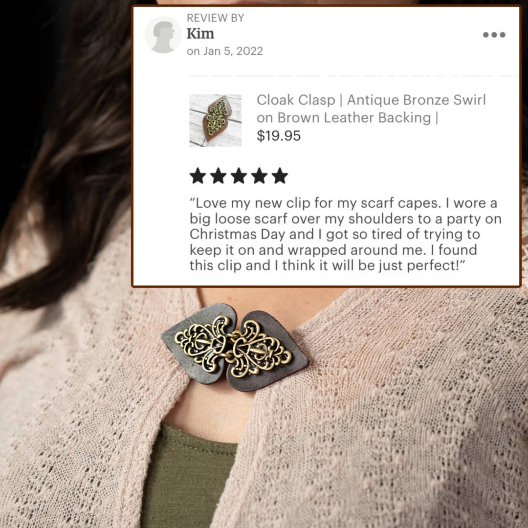 Five-star customer review card for the antique bronze swirl cloak clasp, shown worn