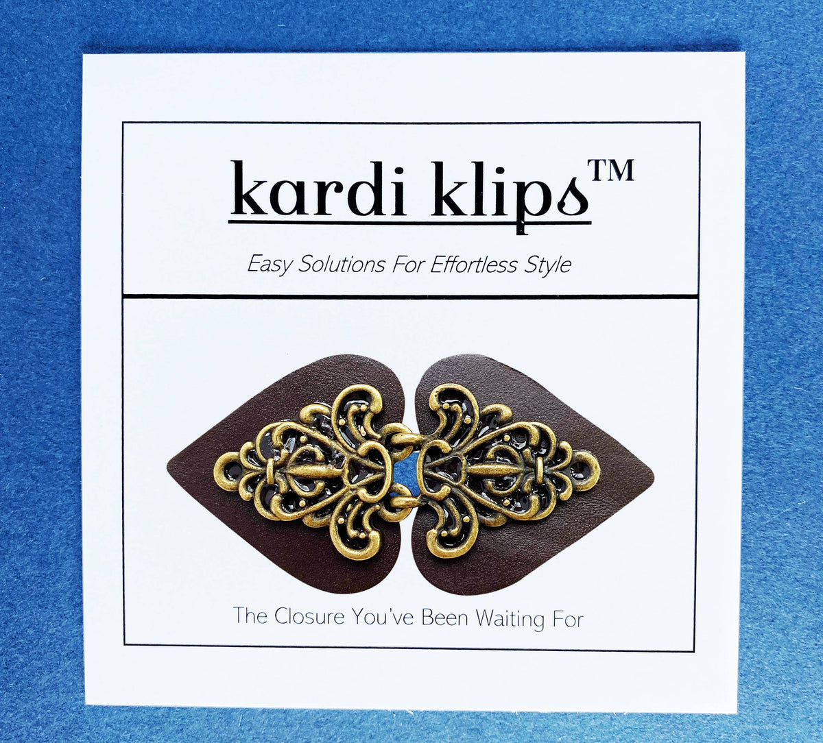 Kardi Klips branded display card holding the dark brown filigree clasp