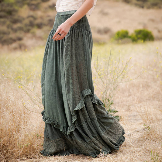 Side view of the basil ruffle pants showing the layered ruffle hem