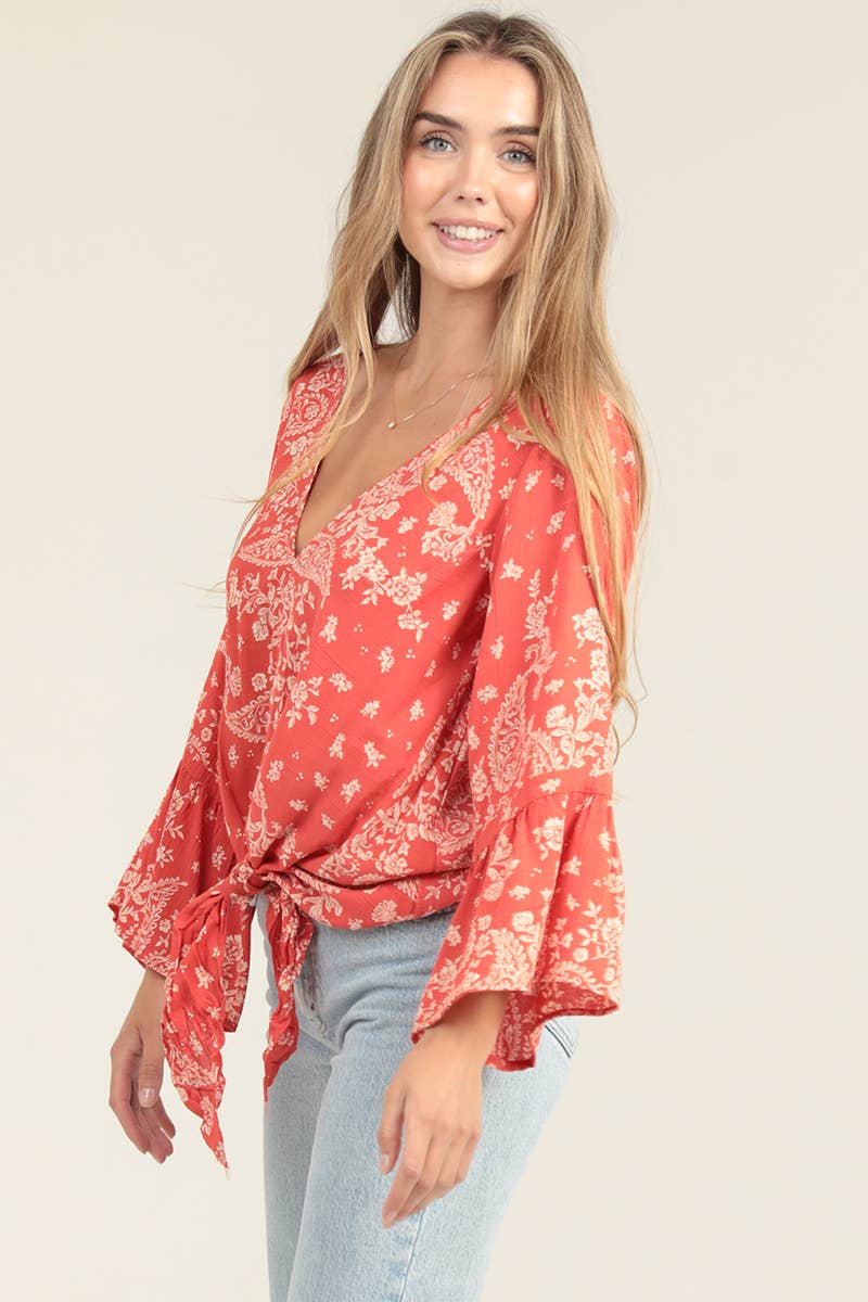 V NECK LONG SLEEVE TOP WITH A TIE AT THE WAIST