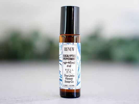 Renew eucalyptus and peppermint essential oil roll-on in a glass bottle for everyday aromatherapy