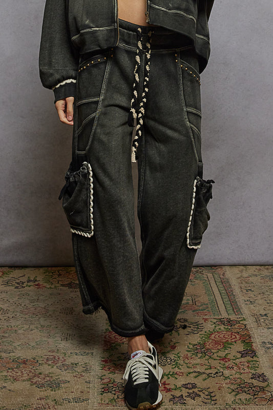 Black French terry wide leg pants with cargo side pockets by Pol Clothing