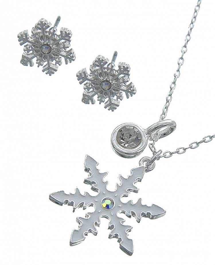 Glitter snowflake pendant and earrings laid flat