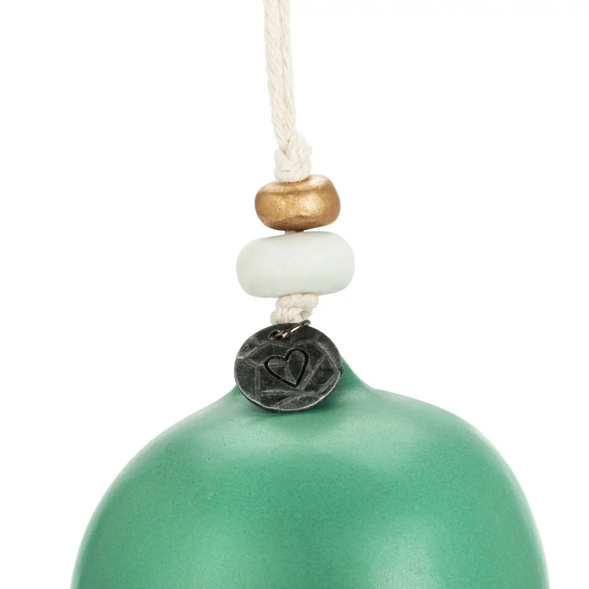 Close-up of the green Thankful holiday bell top with rosette and beads