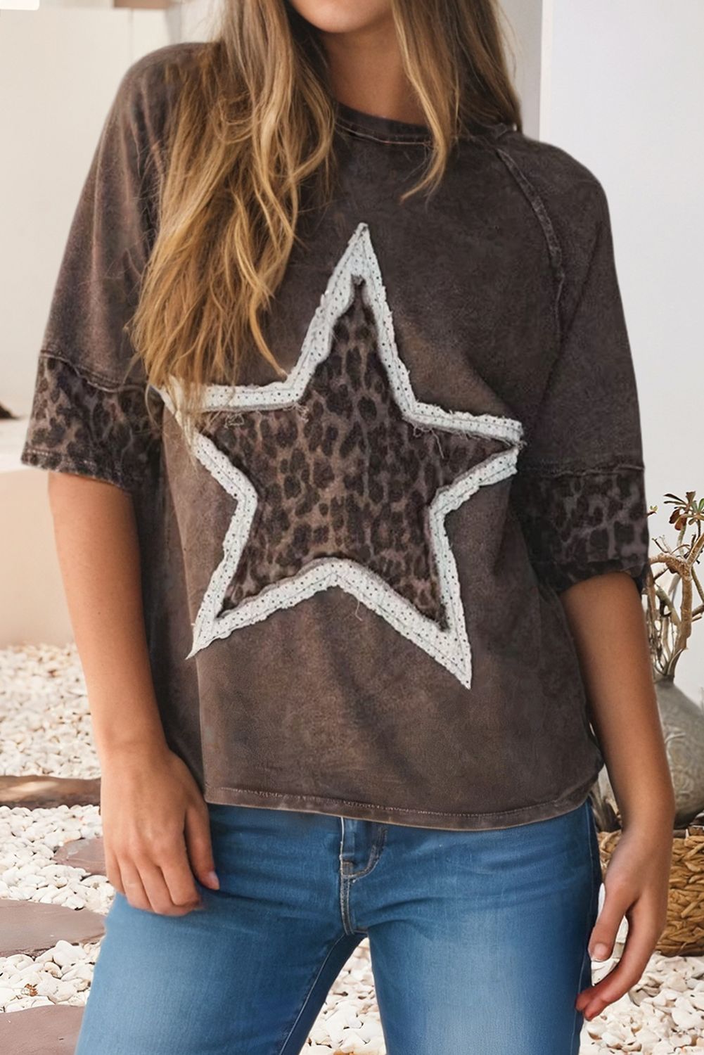 Coffee mineral wash cotton tee with a leopard star patch and exposed-seam detailing