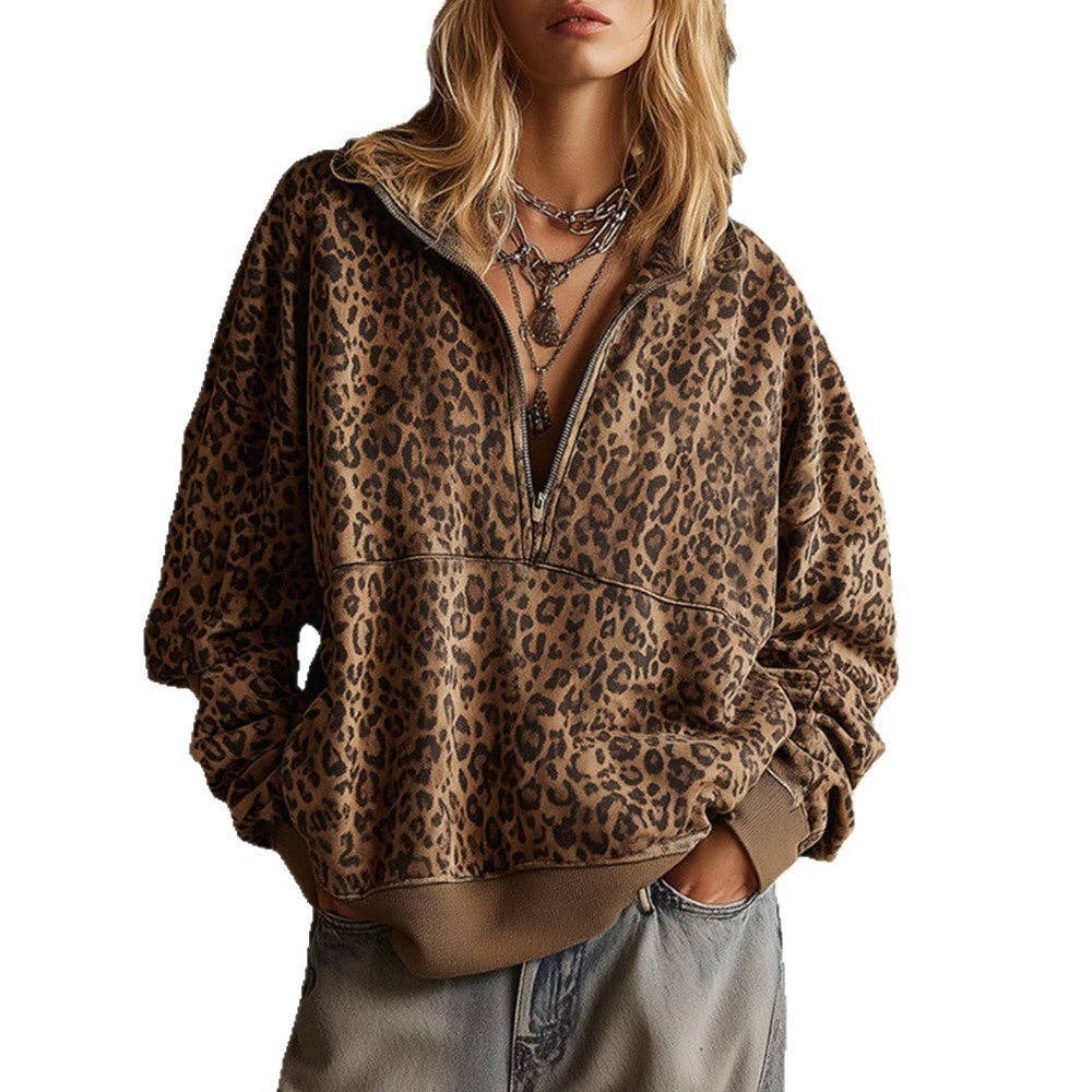 Woman in a coffee brown leopard print half zip oversized sweatshirt