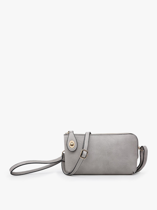 Grey vegan leather crossbody wristlet bag with twist-lock closure and adjustable strap