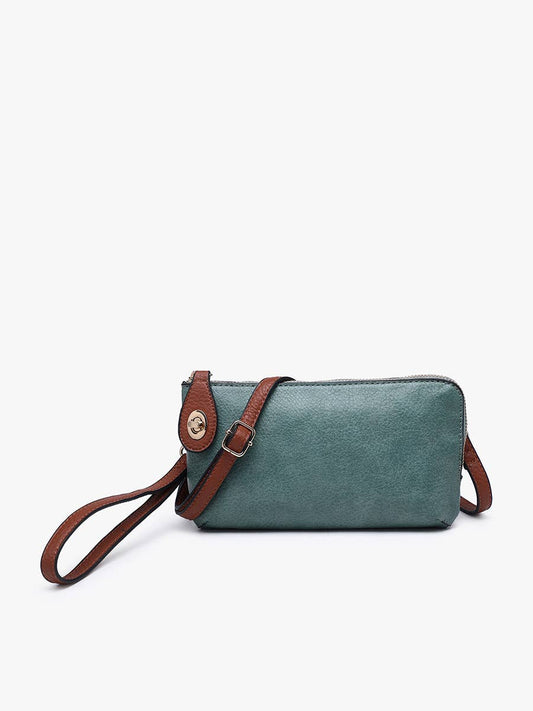 Teal and brown vegan leather crossbody wristlet bag with twist-lock closure and adjustable strap