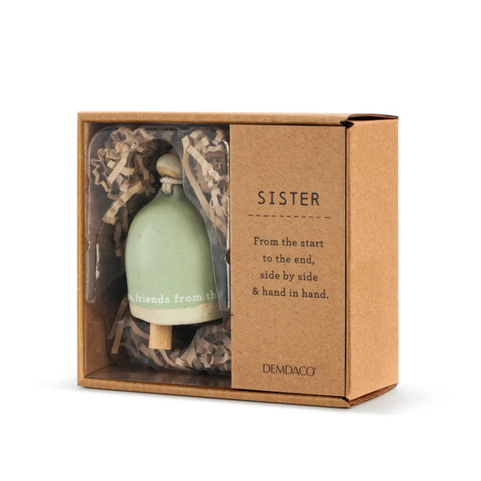 Mini Inspired Bell Sister in its kraft gift box