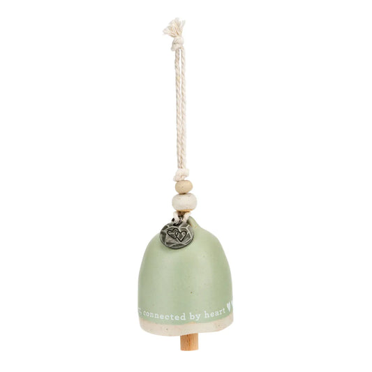 Sage green Mini Inspired Bell hanging from a cord with wooden beads