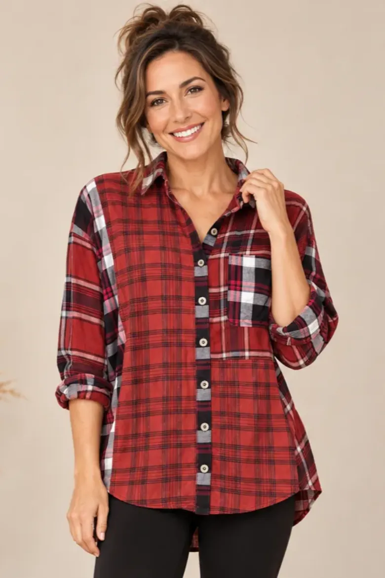Close-up of the mixed plaid flannel shirt showing the different plaid panels and button front