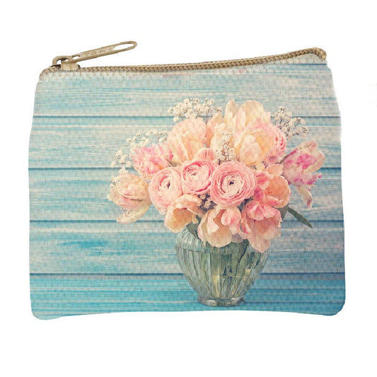 Zip coin purse printed with a photograph of pale pink roses in a glass vase against weathered blue painted boards