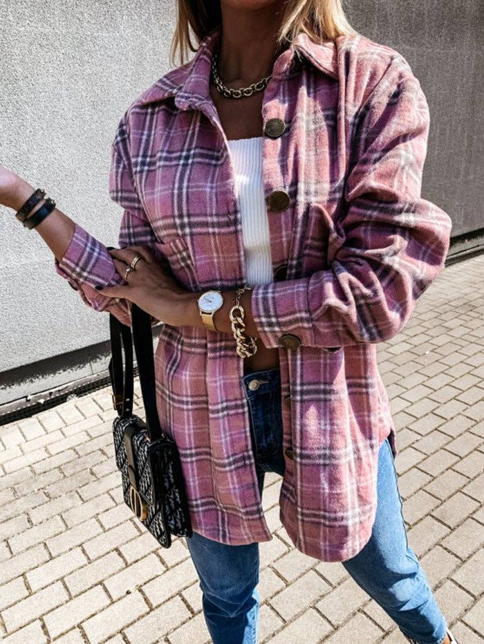 Front view of the pink and purple plaid shacket with button front and curved hem
