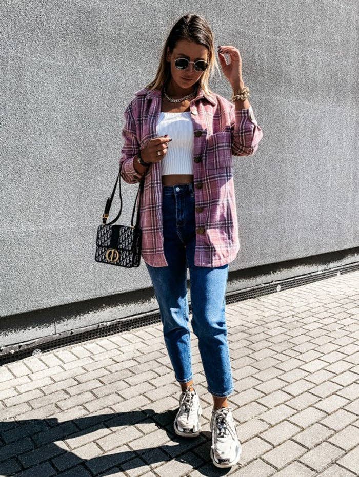 Full-length view of the pink plaid longline shacket falling to mid-thigh