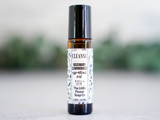 Cleanse rosemary and lemongrass essential oil roll-on in a glass bottle for everyday aromatherapy