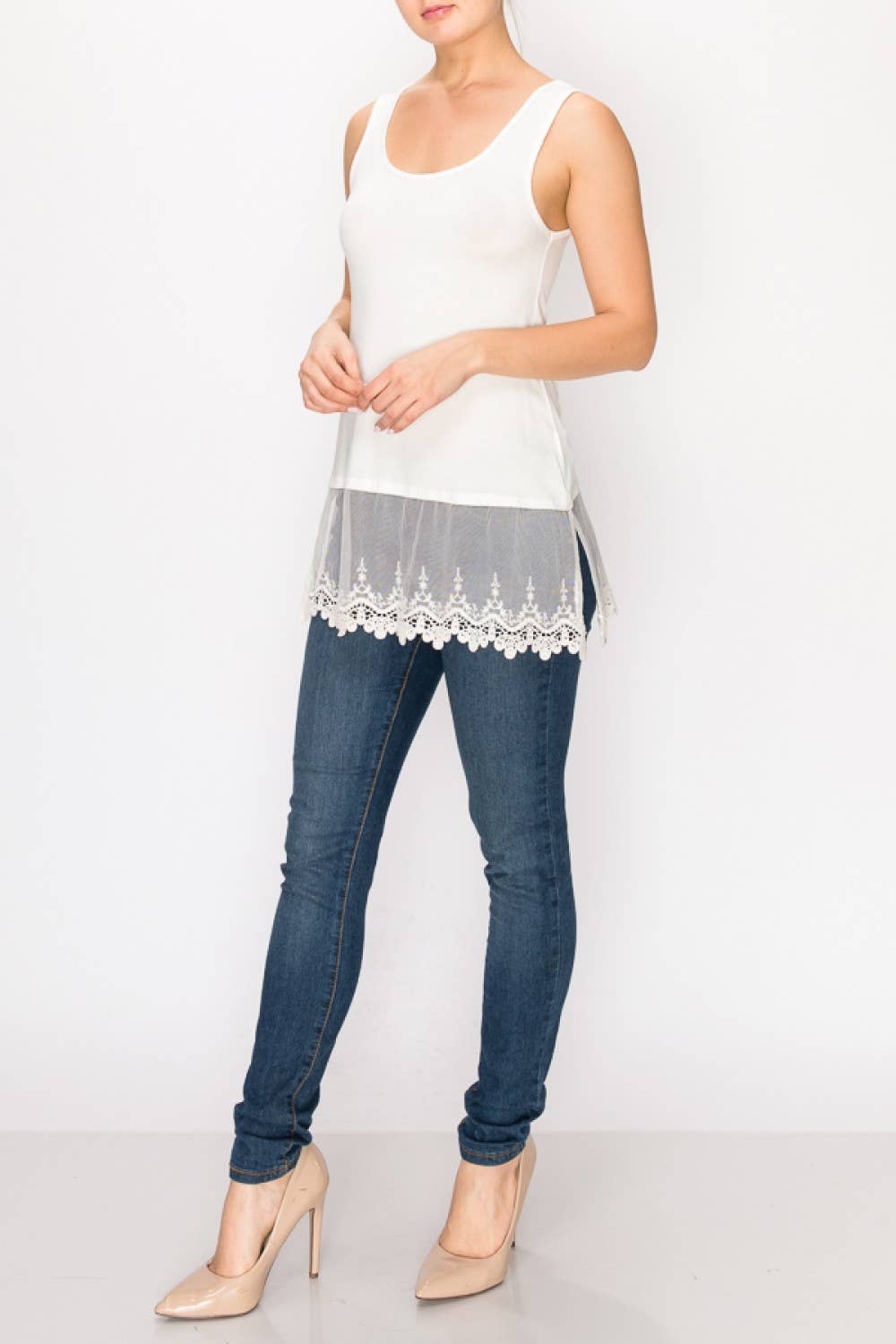 Side view of the ivory lace hem tank