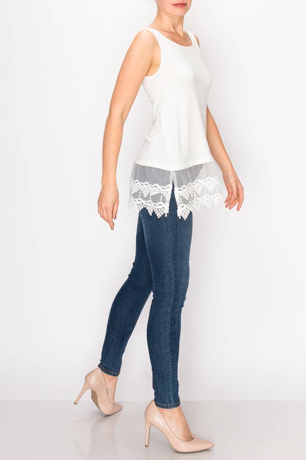 Side view of the ivory relaxed tank showing the lace panel below the hem