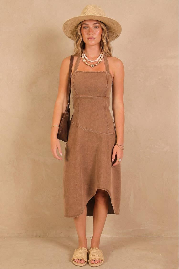 Chocolate stretch denim halter midi dress with a structured square neckline and asymmetrical midi hem
