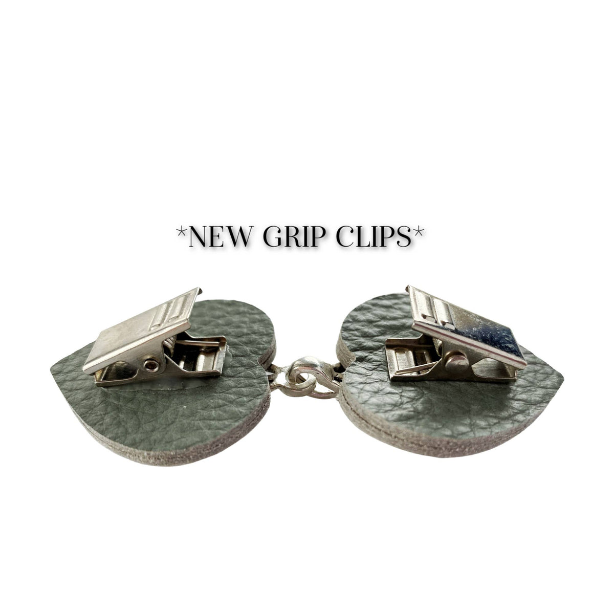 Grip-clip backing graphic: silver alligator clips on sea green leather tabs