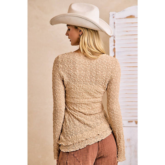 Back view of the tan textured lace top