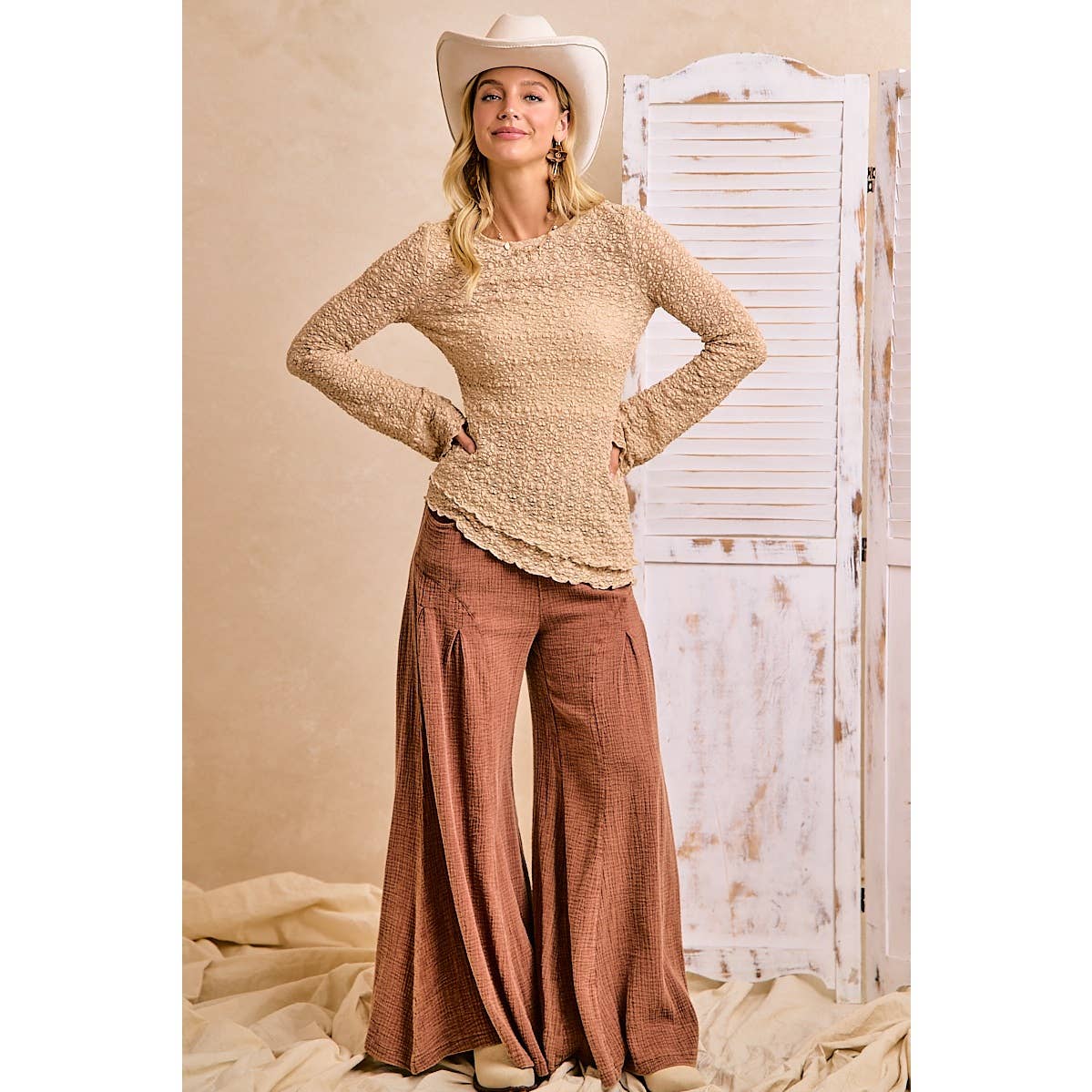 Full-length front view of the tan lace top