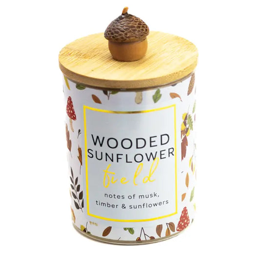 Wooded Sunflower Field scented 10 oz soy jar candle in a clear glass jar.